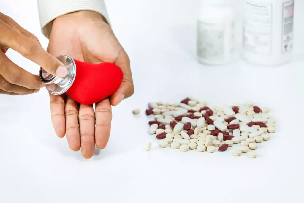 A detailed illustration of essential acute myocardial infarction medications. In the foreground, an array of pharmaceuticals - pills, capsules, and vials - arranged with precision, each representing a specific drug used to treat heart attacks. In the middle ground, a cutaway view of the human heart, with the damaged myocardium highlighted, showcasing the direct impact of these medications. The background is a softly lit, clinical setting, conveying the urgency and importance of these treatments. The lighting is crisp and directional, casting subtle shadows that emphasize the three-dimensional nature of the scene. The overall tone is one of medical expertise and lifesaving purpose, inviting the viewer to appreciate the vital role these medications play in acute myocardial infarction care.