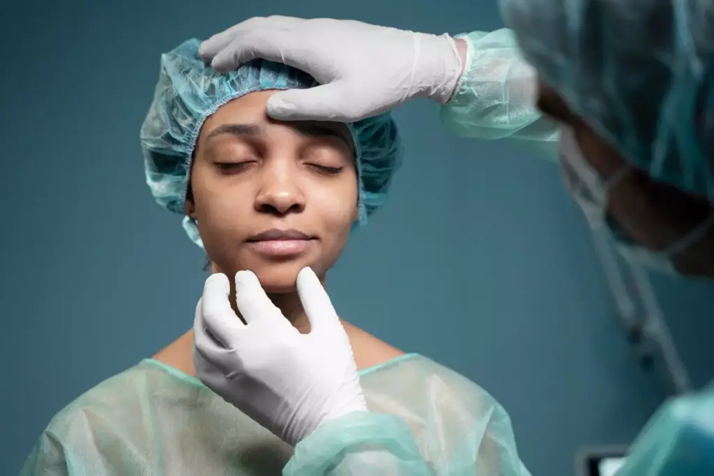 A detailed surgical scene depicting a brain biopsy procedure. The foreground shows a surgeon's gloved hand gently inserting a long, thin needle into the patient's exposed skull, guided by a high-resolution imaging screen. The middle ground reveals the sterile operating theater, with nurses and assistants standing by, surrounded by specialized medical equipment. In the background, moody lighting casts long shadows, creating a sense of focus and gravity to the delicate operation. The overall atmosphere is one of precise, controlled medical intervention, conveying the technical expertise required for this complex neurosurgical procedure.