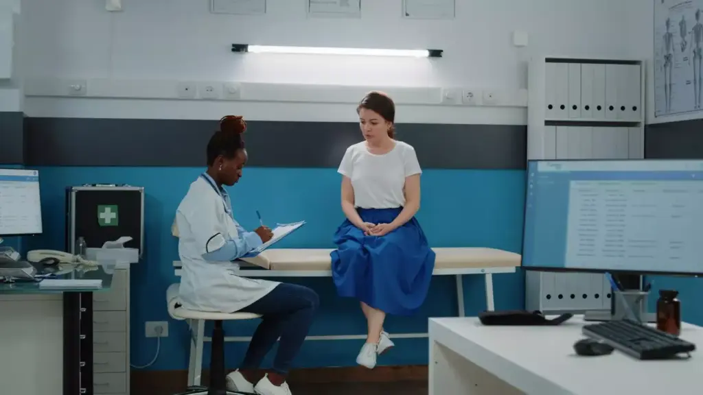 A well-lit, realistic scene depicting a serene medical office setting. In the foreground, a female patient sits comfortably on an exam table, her expression calm and attentive as a female doctor in a white coat examines her. The middle ground showcases various modern medical equipment and supplies, conveying a sense of advanced, high-quality care. The background features tasteful, soothing decor elements like potted plants and abstract artwork, creating a warm, welcoming atmosphere. The lighting is soft and diffused, highlighting the professionalism and care of the medical staff. The overall scene conveys the benefits of female outpatient procedures - a safe, comfortable, and empowering healthcare experience. A well-lit, realistic scene depicting a serene medical office setting. In the foreground, a female patient sits comfortably on an exam table, her expression calm and attentive as a female doctor in a white coat examines her. The middle ground showcases various modern medical equipment and supplies, conveying a sense of advanced, high-quality care. The background features tasteful, soothing decor elements like potted plants and abstract artwork, creating a warm, welcoming atmosphere. The lighting is soft and diffused, highlighting the professionalism and care of the medical staff. The overall scene conveys the benefits of female outpatient procedures - a safe, comfortable, and empowering healthcare experience.