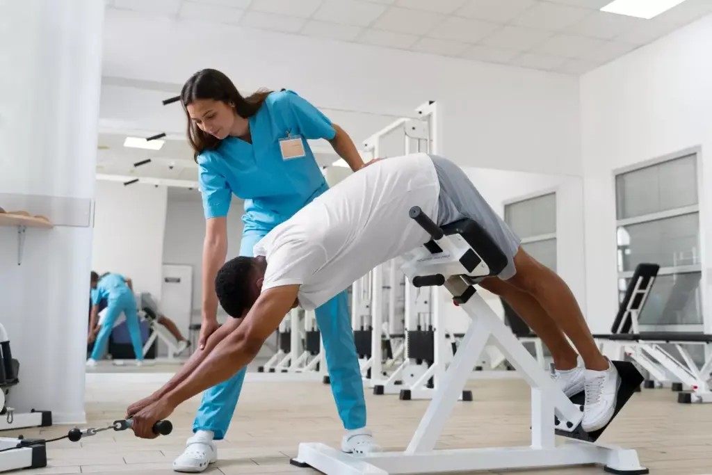 A spacious, bright rehabilitation gym bathed in warm, natural light. In the foreground, a patient in athletic wear is carefully stretching their knee, guided by a physical therapist attentively monitoring their progress. The middle ground features various exercise equipment and assistive devices, hinting at the patient's advanced stage of recovery. The background showcases large windows overlooking a lush, verdant outdoor scene, creating a serene and calming atmosphere. The image conveys a sense of focused determination, gradual improvement, and the patient's journey towards regaining full mobility after their ACL surgery.