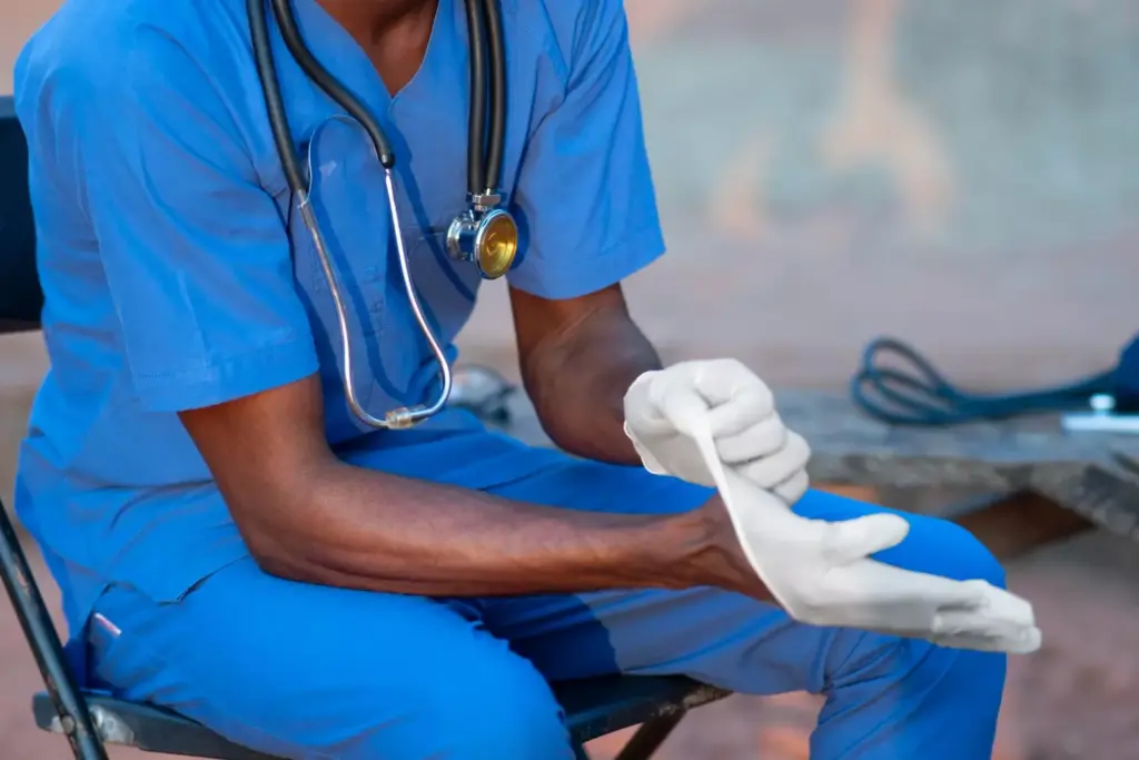 Simultaneous bilateral knee replacement surgery: A detailed medical illustration showcasing the replacement of both knees in a single procedure. The foreground depicts the surgical incisions, implanted prosthetic knee joints, and the surrounding anatomy in vivid anatomical detail. The middle ground highlights the complex instrumentation and techniques employed by the orthopedic surgeon. The background features a dimly lit operating room with specialized lighting, creating a somber, clinical atmosphere. The overall composition conveys the technical precision and gravity of this challenging double knee replacement surgery. Simultaneous bilateral knee replacement surgery: A detailed medical illustration showcasing the replacement of both knees in a single procedure. The foreground depicts the surgical incisions, implanted prosthetic knee joints, and the surrounding anatomy in vivid anatomical detail. The middle ground highlights the complex instrumentation and techniques employed by the orthopedic surgeon. The background features a dimly lit operating room with specialized lighting, creating a somber, clinical atmosphere. The overall composition conveys the technical precision and gravity of this challenging double knee replacement surgery.