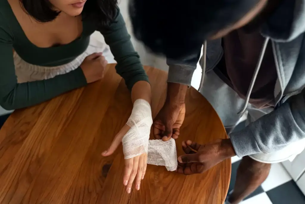 A close-up view of a human hand with a visible surgical scar on the palm, showcasing proper wound care techniques. The hand is gently bandaged, with a clear, sterile dressing covering the incision. Soft, diffused lighting illuminates the scene, creating a calming, clinical atmosphere. The background is blurred, keeping the focus on the hand and the healing process. The image conveys the importance of meticulous scar management in the initial stages of recovery from carpal tunnel release surgery. A close-up view of a human hand with a visible surgical scar on the palm, showcasing proper wound care techniques. The hand is gently bandaged, with a clear, sterile dressing covering the incision. Soft, diffused lighting illuminates the scene, creating a calming, clinical atmosphere. The background is blurred, keeping the focus on the hand and the healing process. The image conveys the importance of meticulous scar management in the initial stages of recovery from carpal tunnel release surgery.