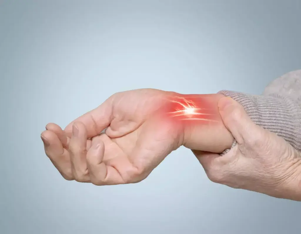 Detailed medical illustration of a carpal tunnel release surgery. In the foreground, a realistic close-up view of the surgical incision in the palm, exposing the transverse carpal ligament. Precise anatomical detail of the exposed tendons and nerves. Bright surgical lighting illuminates the scene, creating clear shadows and highlights. In the middle ground, the surgeon's gloved hands meticulously operating with surgical tools. The background shows a sterile operating room environment with medical equipment. The overall mood is clinical, informative, and focused on the technical aspects of the procedure.