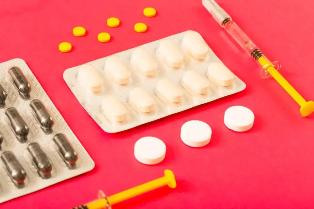 A neatly arranged still life showcasing a selection of common breast chemotherapy medications. The foreground features several pill bottles, each with a clear label displaying the drug name. The middle ground includes various tablets and capsules in different shapes and colors, artfully scattered across a clean, neutral surface. The background maintains a soft, muted tone, allowing the pharmaceutical items to take center stage. Gentle, diffused lighting from an unseen source casts subtle shadows, highlighting the textures and forms of the drugs. The overall composition conveys a sense of clinical precision and informative intent, suitable for inclusion in a medical reference article.