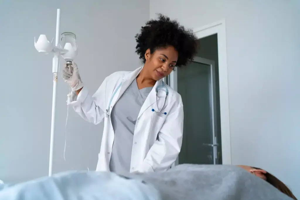 A bright, well-lit medical room with a woman undergoing chemotherapy treatment for breast cancer. In the foreground, a nurse carefully administers an intravenous infusion of Adriamycin and Cyclophosphamide, the foundation of the treatment regimen. The patient's expression is one of calm determination, as she gazes out a large window in the middle ground, with a view of a lush, verdant garden beyond. The lighting is soft and diffused, casting a warm, comforting glow over the scene. The overall mood is one of hope and resilience in the face of a challenging medical procedure.