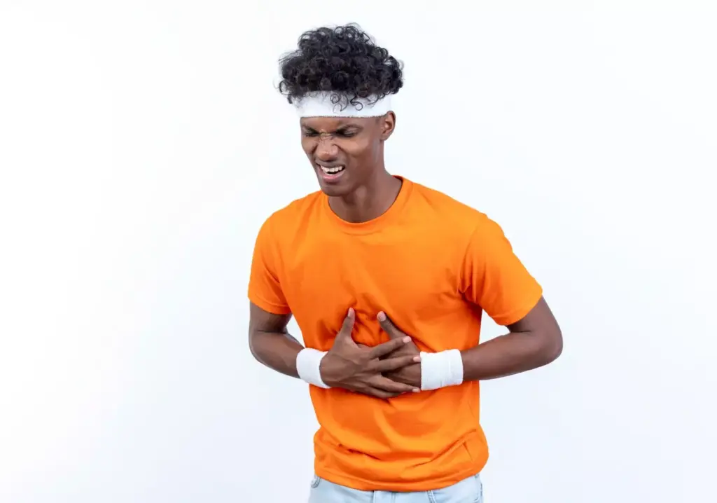 Sick young sporty man wearing headband