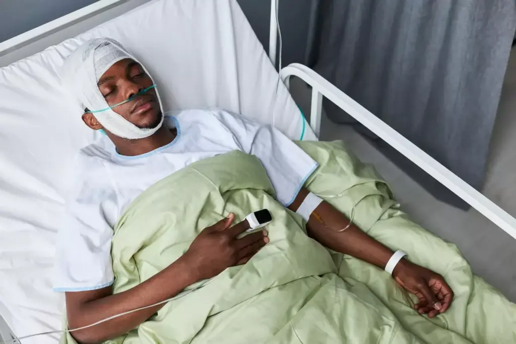 A person lying in bed, their head wrapped in bandages, eyes closed in apparent discomfort. In the background, a blurred but recognizable IV stand and medical equipment, suggesting the setting of a chemotherapy treatment. Muted colors, a sense of fatigue and unease permeates the scene. Diffused lighting casts a soft, melancholic glow, highlighting the connection between chemotherapy and the resulting headache. The composition emphasizes the individual's struggle, conveying the physical and emotional toll of the treatment. A person lying in bed, their head wrapped in bandages, eyes closed in apparent discomfort. In the background, a blurred but recognizable IV stand and medical equipment, suggesting the setting of a chemotherapy treatment. Muted colors, a sense of fatigue and unease permeates the scene. Diffused lighting casts a soft, melancholic glow, highlighting the connection between chemotherapy and the resulting headache. The composition emphasizes the individual's struggle, conveying the physical and emotional toll of the treatment.