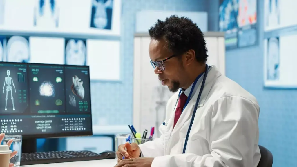 A gleaming medical device hovers over a human body, its advanced technology pulsing with energy. The foreground shows the device's intricate mechanisms, designed to precisely target and neutralize cancerous tumor cells. In the middle ground, translucent 3D visualizations depict the device's internal workings, revealing the complex algorithms that guide its precision. The background fades into a serene, sterile medical environment, bathed in a soft, clinical light that reflects the device's advanced capabilities. The overall scene conveys a sense of hope and scientific breakthrough, hinting at the transformative power of this revolutionary cancer treatment. A gleaming medical device hovers over a human body, its advanced technology pulsing with energy. The foreground shows the device's intricate mechanisms, designed to precisely target and neutralize cancerous tumor cells. In the middle ground, translucent 3D visualizations depict the device's internal workings, revealing the complex algorithms that guide its precision. The background fades into a serene, sterile medical environment, bathed in a soft, clinical light that reflects the device's advanced capabilities. The overall scene conveys a sense of hope and scientific breakthrough, hinting at the transformative power of this revolutionary cancer treatment.