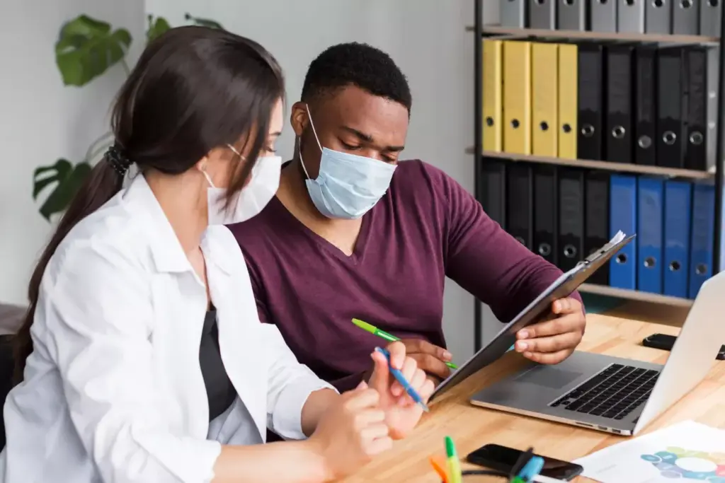 A warm, inviting scene depicting the various grants and financial assistance programs available for breast cancer patients. The foreground features stacks of documents and forms, symbolizing the administrative process, alongside a compassionate healthcare worker providing guidance. The middle ground showcases a diverse group of patients, each with a unique story, gathered in a supportive, nurturing environment. The background depicts a serene, natural landscape, conveying a sense of hope and healing. The lighting is soft and diffused, creating a calming atmosphere. The overall composition conveys the importance of navigating the complex landscape of breast cancer financial support, with care and empathy at the forefront.