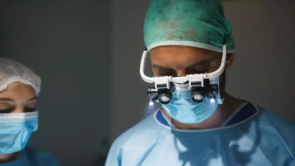 medical team performing surgery medical team performing surgery