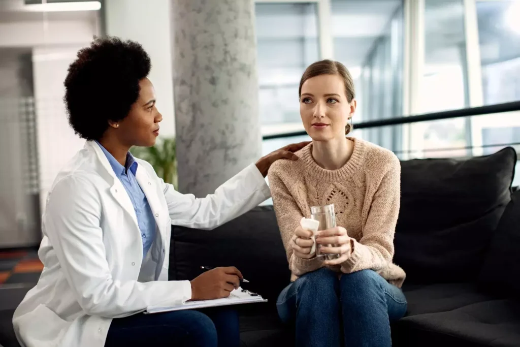 A doctor talking to a patient