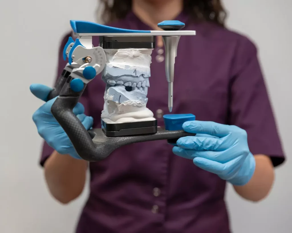 Detailed anatomical study of dental implants and bone grafts. Foreground depicts cross-section of jawbone, revealing titanium implant fixture and surrounding bone graft material. Midground shows magnified view of implant-bone interface, with new bone growth integrating with implant surface. Background softly focused, showcasing dental tools and surgical equipment. Crisp, high-resolution rendering with neutral lighting and clinical, educational tone. Muted color palette emphasizes technical nature of procedure. Smooth, photorealistic style conveys precise medical illustration. Detailed anatomical study of dental implants and bone grafts. Foreground depicts cross-section of jawbone, revealing titanium implant fixture and surrounding bone graft material. Midground shows magnified view of implant-bone interface, with new bone growth integrating with implant surface. Background softly focused, showcasing dental tools and surgical equipment. Crisp, high-resolution rendering with neutral lighting and clinical, educational tone. Muted color palette emphasizes technical nature of procedure. Smooth, photorealistic style conveys precise medical illustration.