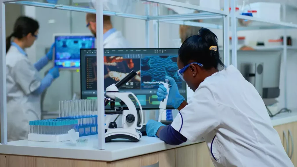 A state-of-the-art laboratory setup for high-throughput antigen screening. In the foreground, a bank of robotic pipettes rapidly dispenses samples into a multi-well plate. In the middle ground, a high-resolution microscope captures detailed images of the plate, while a powerful computer system analyzes the data. In the background, a clean, well-lit laboratory space with specialized equipment and glassware. Bright, uniform lighting illuminates the scene, highlighting the precision and efficiency of the screening process. The overall atmosphere conveys a sense of scientific rigor and innovation, reflecting the cutting-edge nature of this advanced cancer therapy technique.