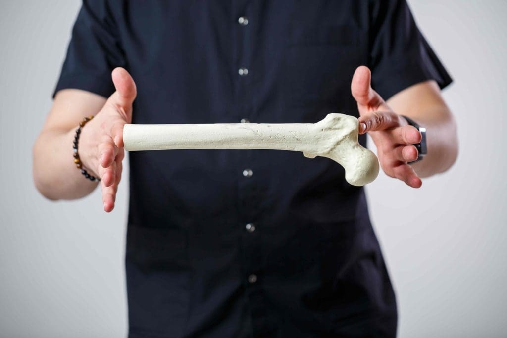 Surgical close-up showcasing a block of cancellous bone Surgical close-up showcasing a block of cancellous bone