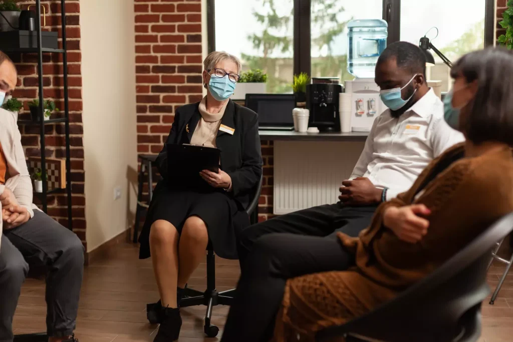 An integrative oncology clinic with a warm, welcoming atmosphere. In the foreground, a compassionate doctor consults with a patient, discussing alternative therapies like acupuncture, herbal medicine, and meditation. The middle ground features a cozy treatment room with soothing decor and natural lighting filtering in. In the background, a serene garden oasis offers a tranquil space for patients to find respite and healing. The overall scene conveys a holistic, patient-centered approach to cancer care, blending conventional and complementary treatments.