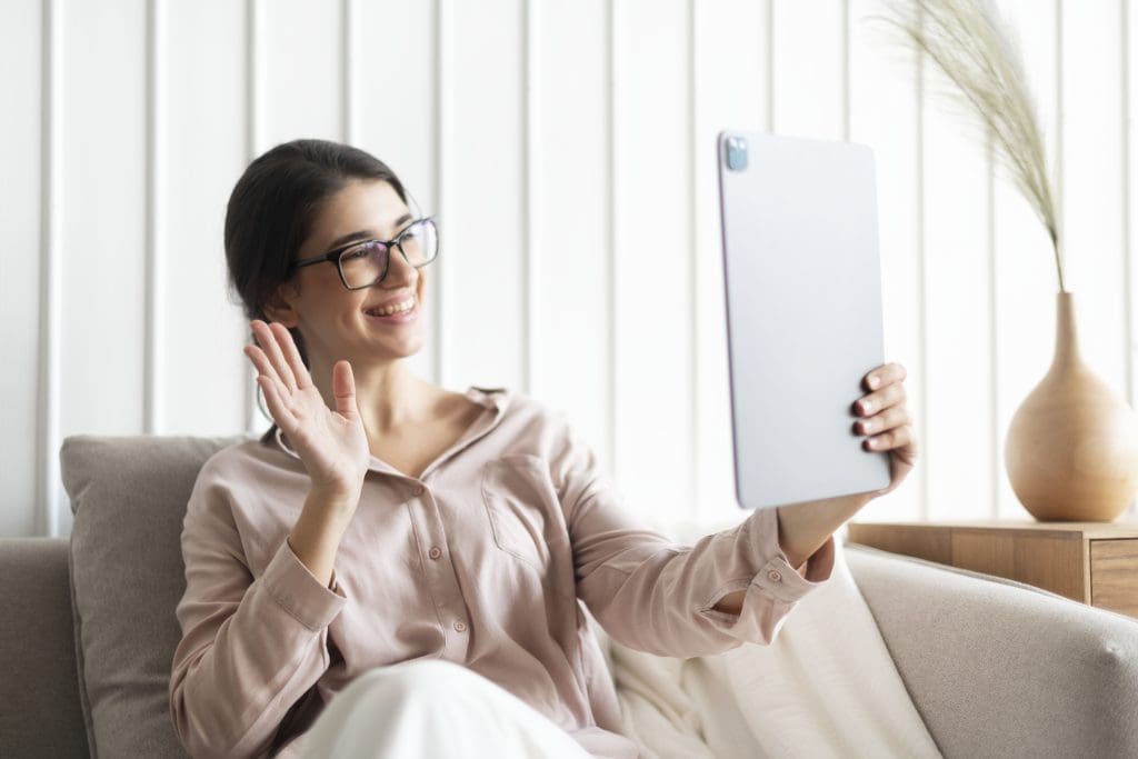happy woman video calling tablet new normal LIV Hospital