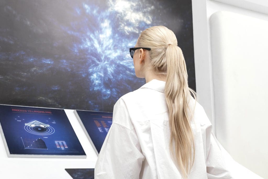 side view woman with digital glasses working monitor LIV Hospital