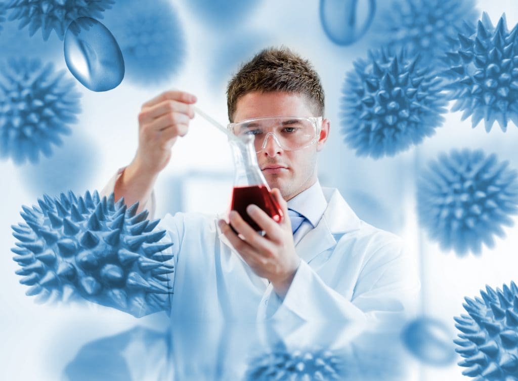 serious chemist looking beaker with blood LIV Hospital