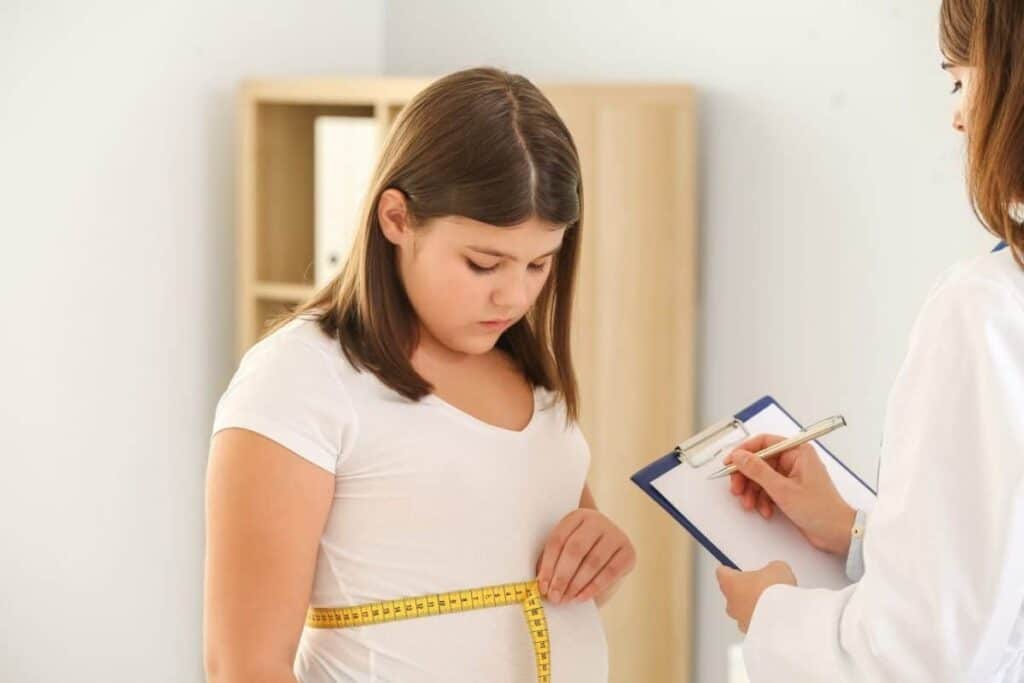 how much should a 12-year-old girl weigh