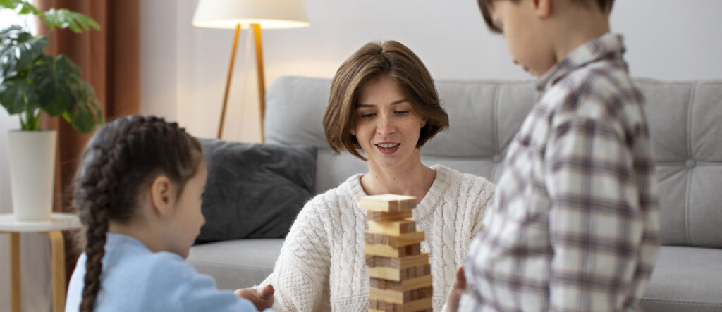 medium shot mother playing with kids 1 LIV Hospital