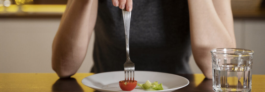 woman trying eat healthy home 1 LIV Hospital