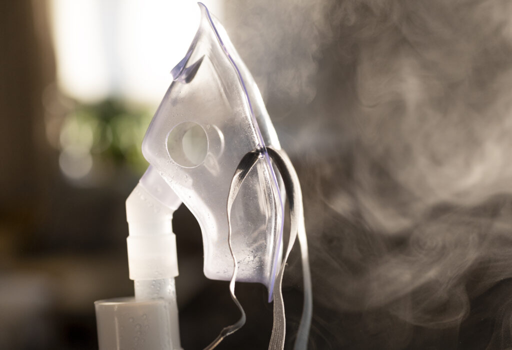 side view adult holding nebulizer 1 LIV Hospital