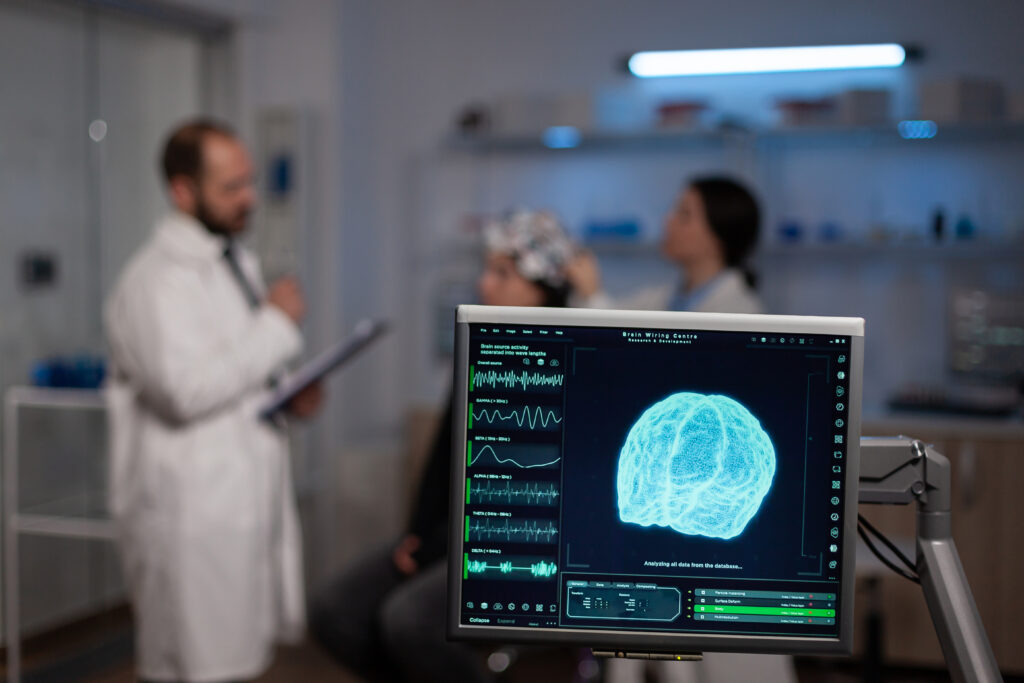 neuroscience doctor holding clipboard showing treatment against brain disease patient with eeg headset woman sitting neurological scientific laboratory treating nervous system dysfunctions LIV Hospital