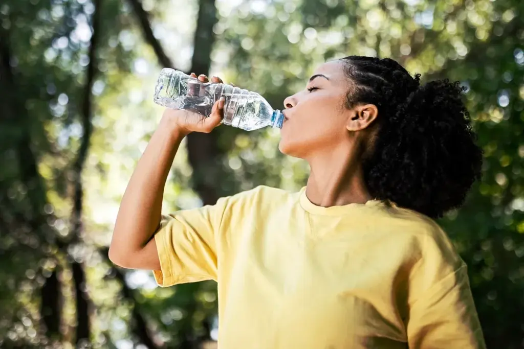 Woman Drinking Water Bottle Urinary Problems