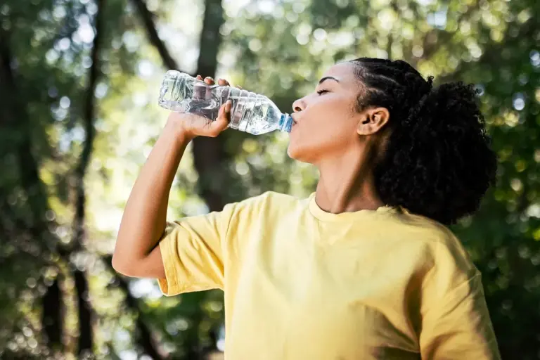 Woman Drinking Water Bottle Urinary Problems