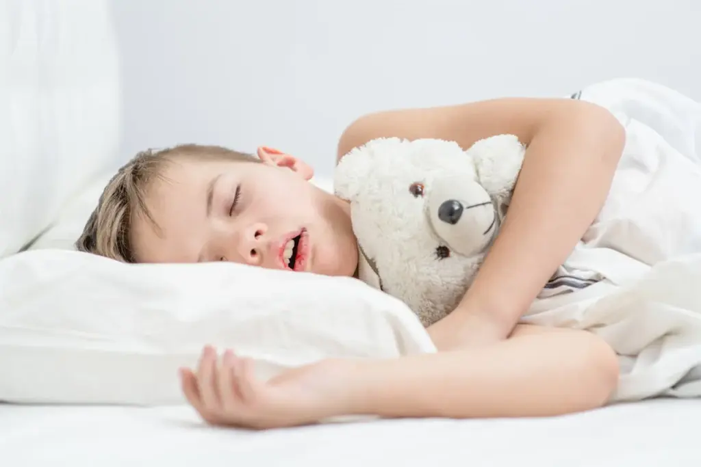 What causes snoring in children?