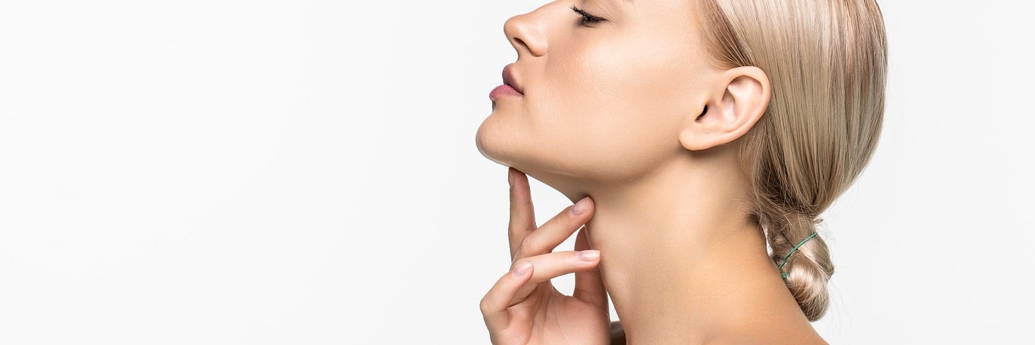 beautiful young girl touching her face youth skin care concept x banner 1500 500 LIV Hospital