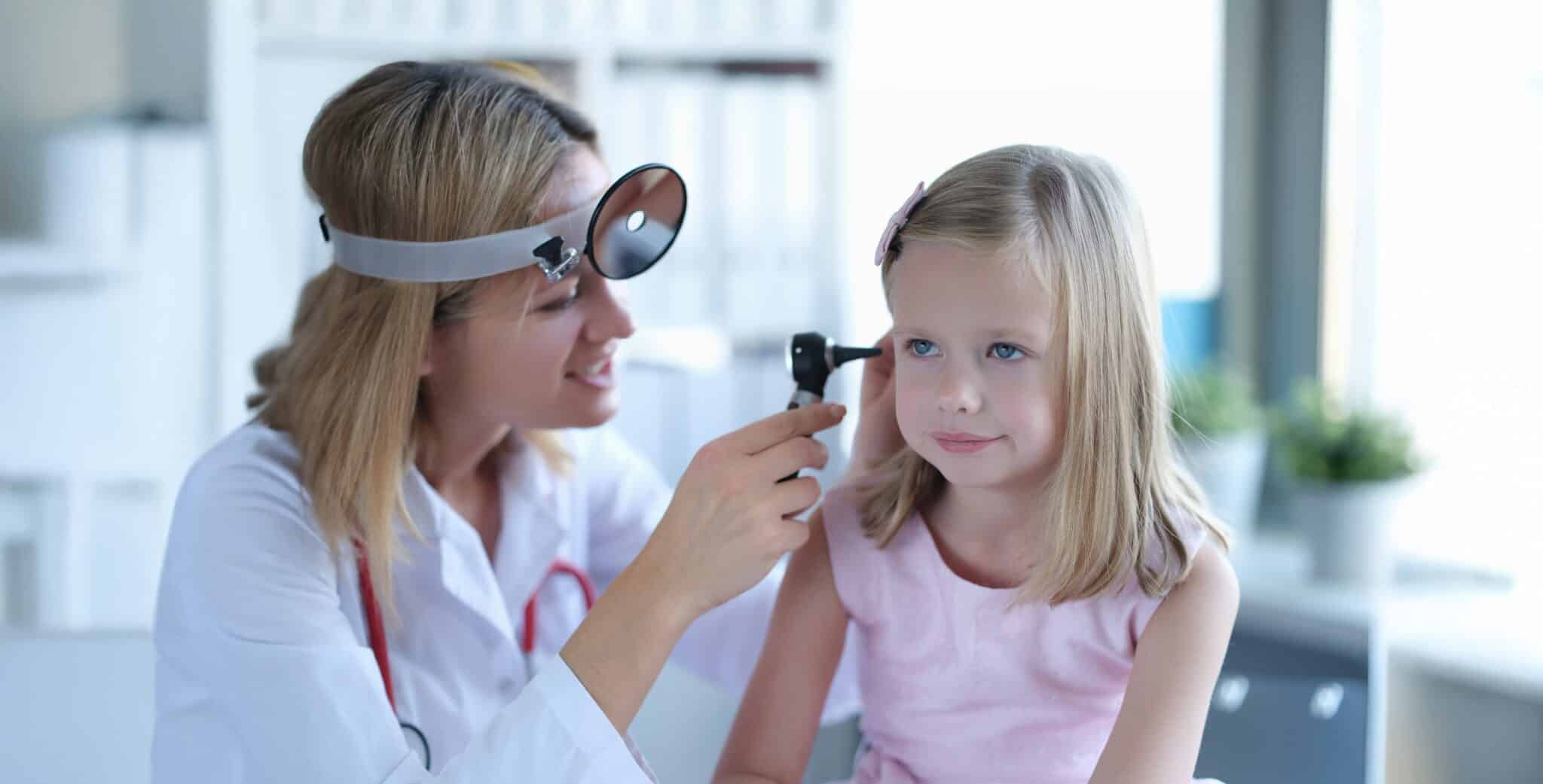 woman otolaryngologist clinic looks ear girl scaled LIV Hospital