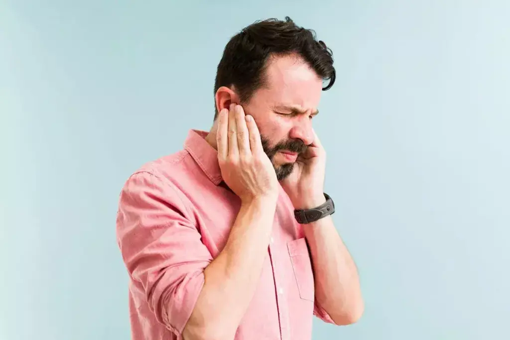 Why Does My Left Ear Vibrate? Causes and Solutions